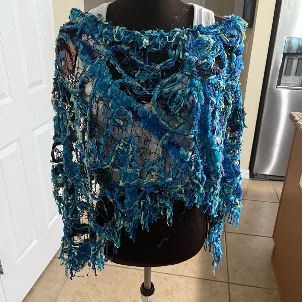 Blue multicolor knit boutique shawl. Very unique and funky.